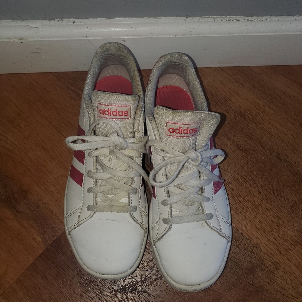 Adidas tennis sneakers.